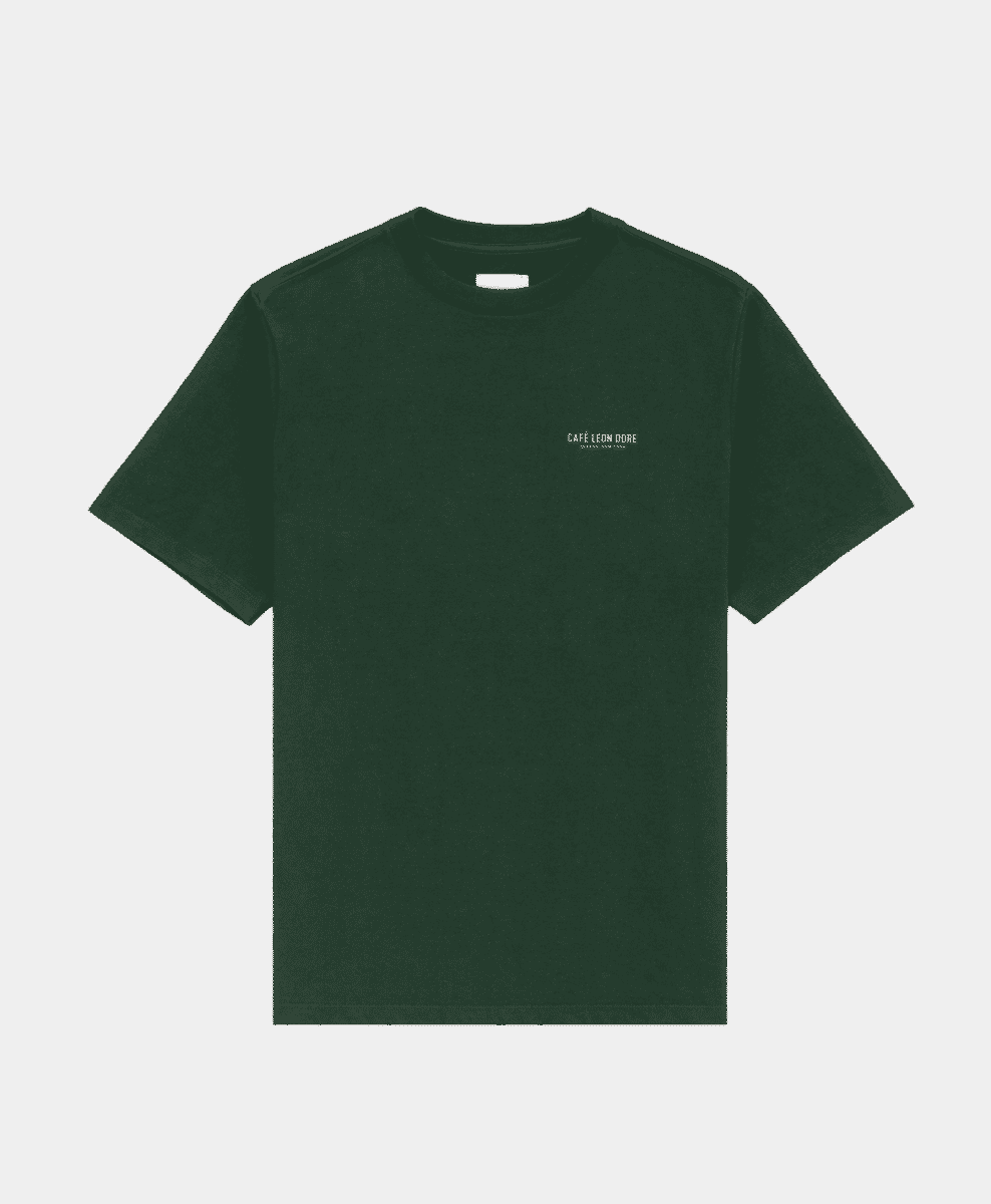 A dark green T-shirt with white Café Leon Dore embroidery on the chest.