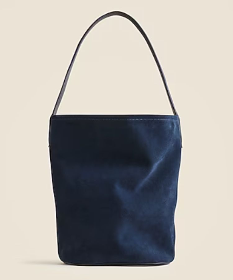 Front view of the Berkeley Bucket Bag showing its structure and drawstring.