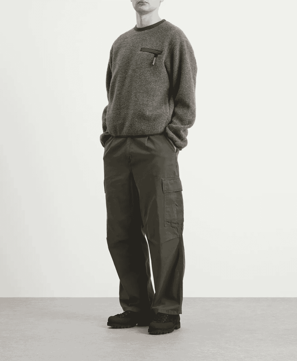 Rear view of the Thisisneverthat technical pullover showing the hood and fit.