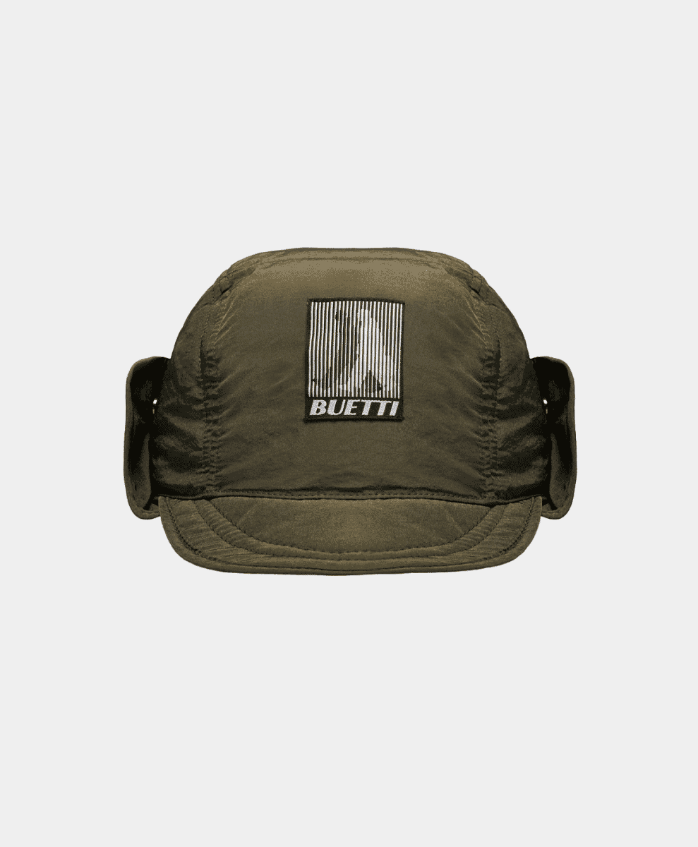 Side profile of the Buetti Trapper Hat showing the insulated ear flaps.