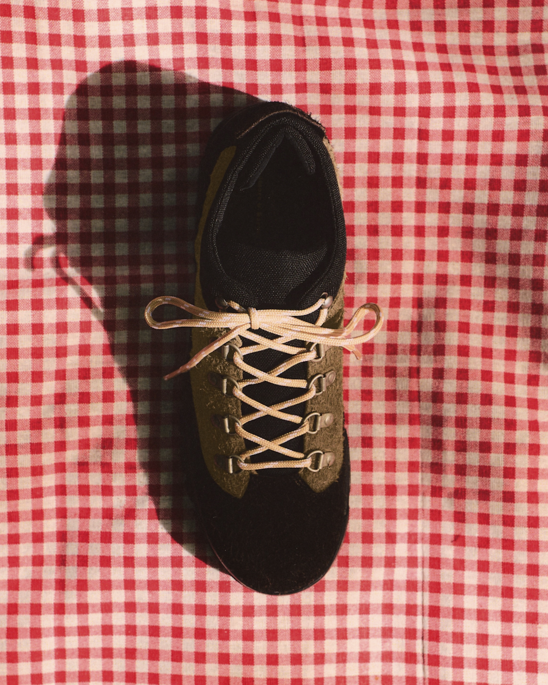 Side by side comparison angle showing the low-top silhouette of the artisan hiking shoe.